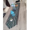 Chemin de table artisanal vert noir écru en coton tissé main de Guinée. Une pièce authentique et chaleureuse pour votre décorati
