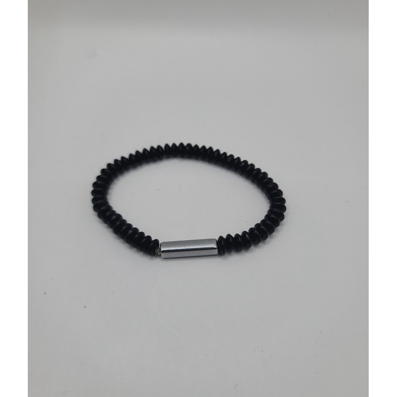 Bracelet noir spiralé avec anneau métal argenté. Bijou moderne, minimaliste et masculin en acier inoxydable.