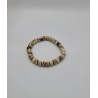 Bracelet homme en perles crème marbrées au style ethnique naturel. Accessoire léger, élégant et authentique.